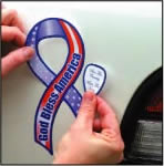 Photo of magnetic ribbon being applied to car.