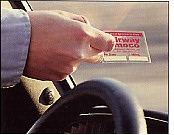 picture of customer applying a service reminder to inside of auto window